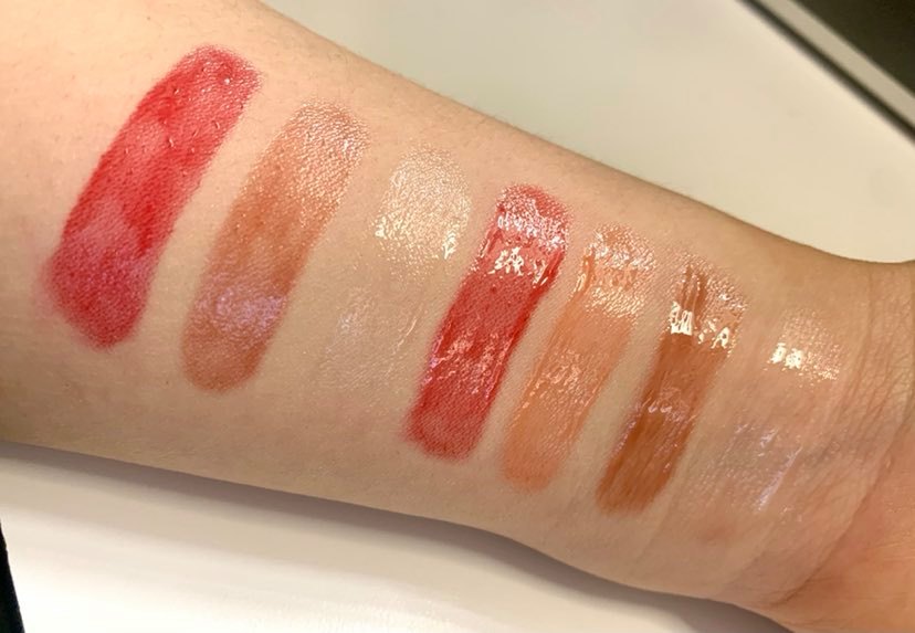 Swatches of Kosas Wet Lip Oil Gloss and Tower 28 Lip Jelly