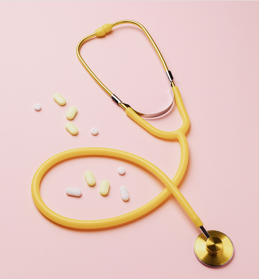 Photo of a stethoscope and some pills